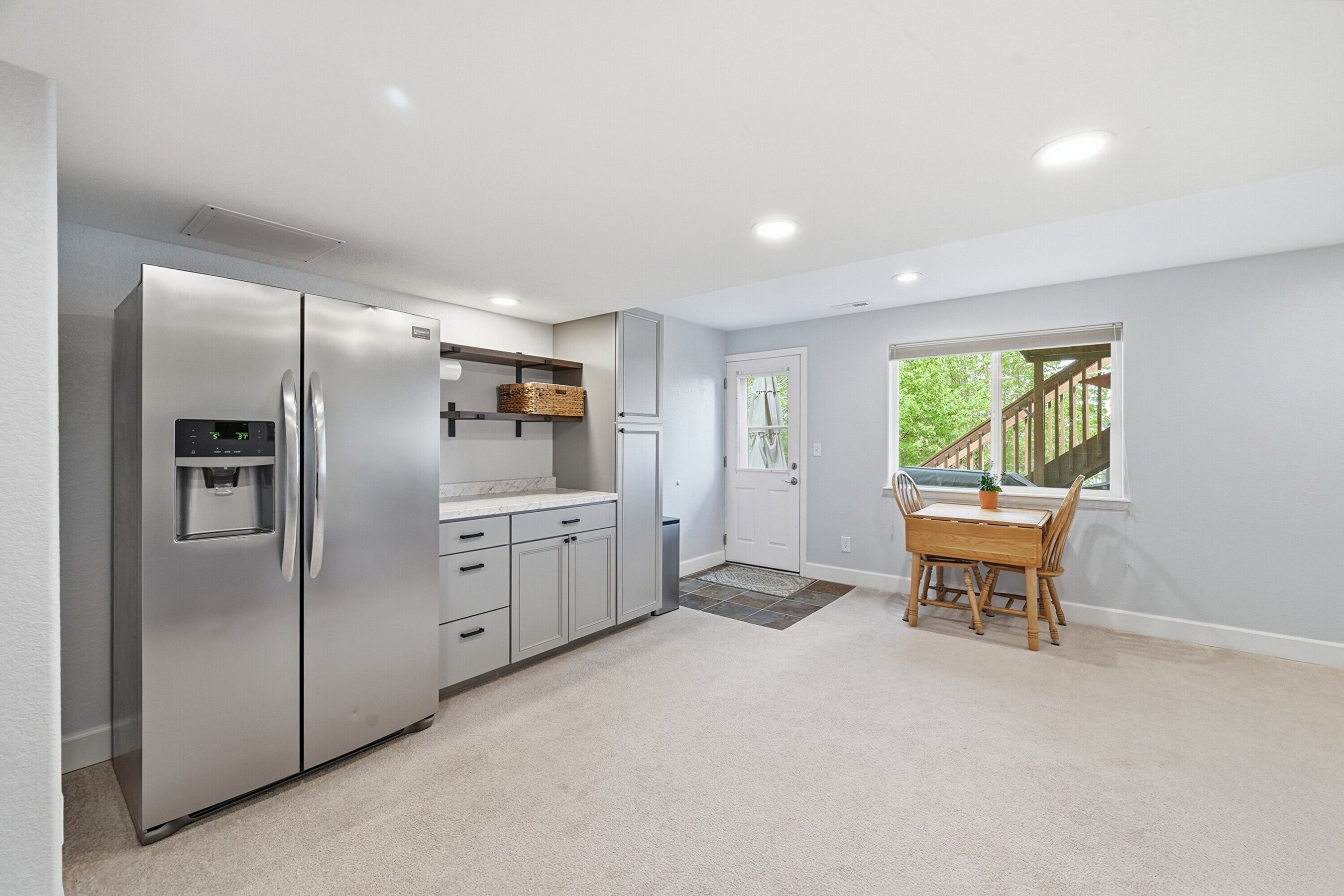 Kitchen Area in Basement with walkout access