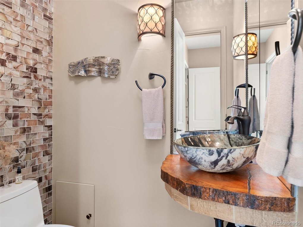 Powder Room with custom made Canadian Oak countertop and shelf
