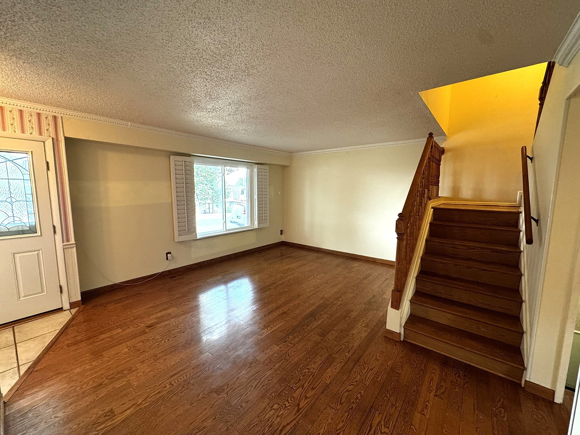 Large Bright Living Room with Wood Flooring