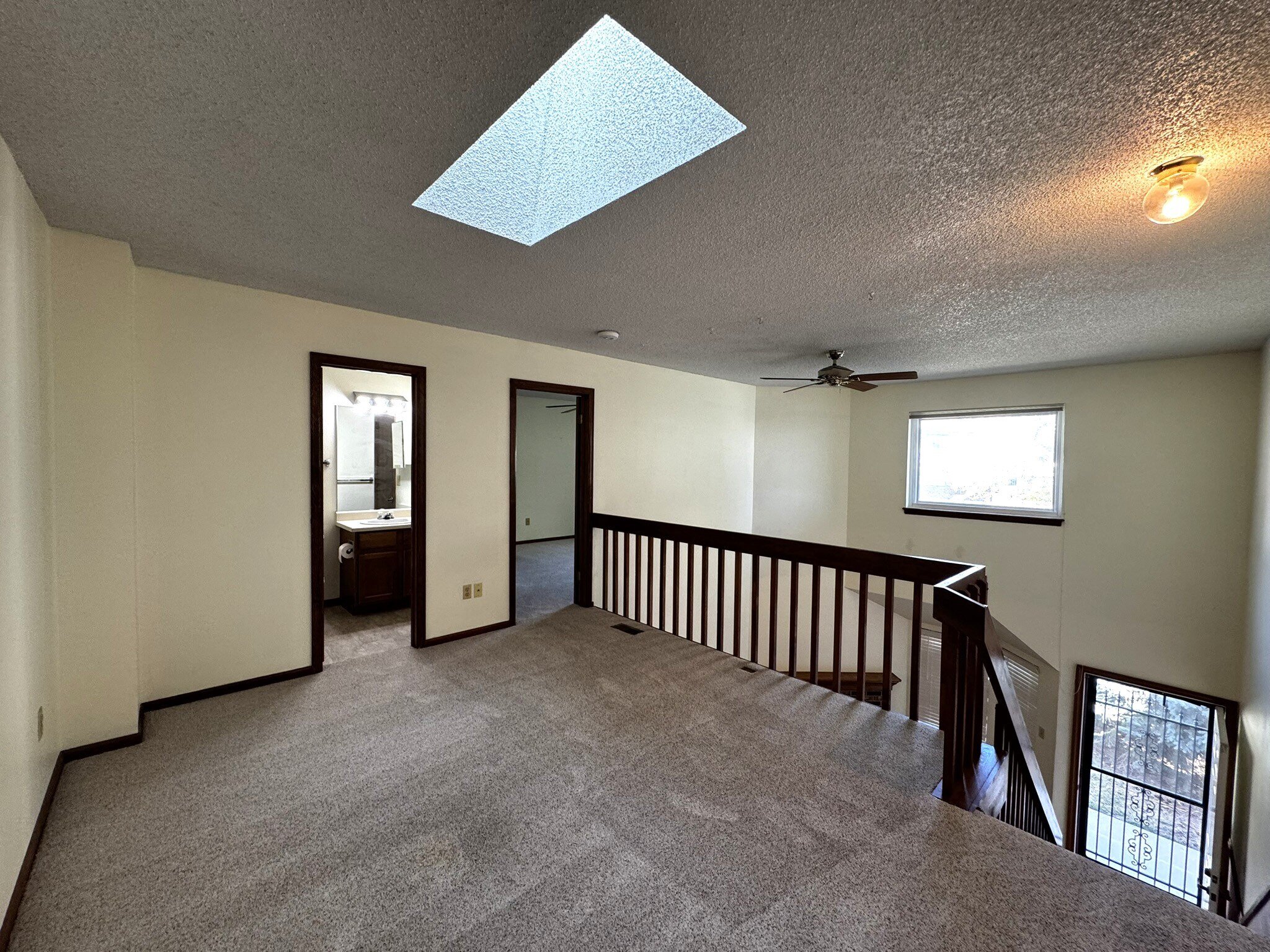 Bright Loft with Skylight and Bathroom Entry