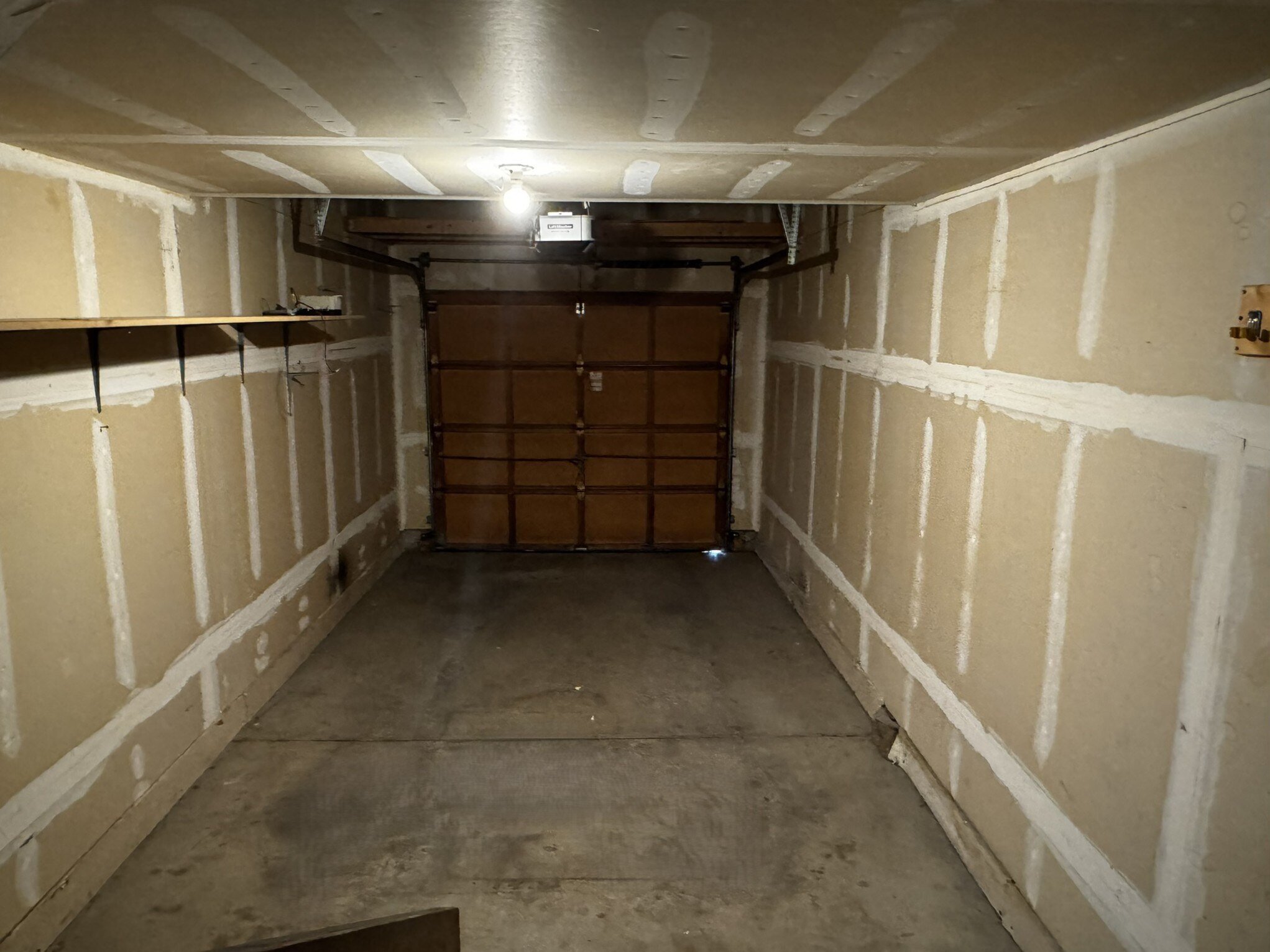 Deep One-Car Garage Enters Into Home