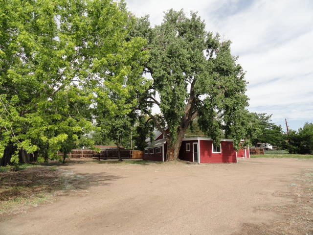 This is the outbuilding that has plenty of additional parking room for the toys!