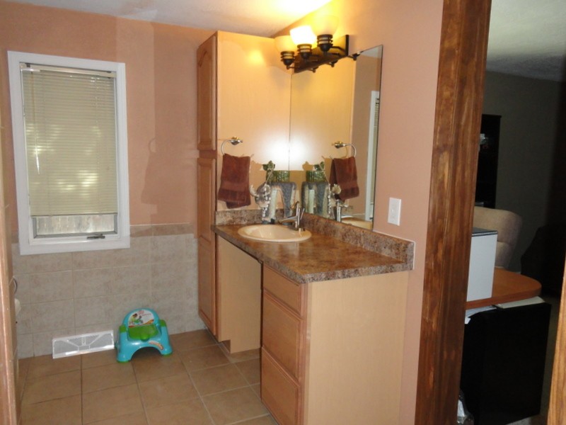 Master bath with high counters and walk in closet!