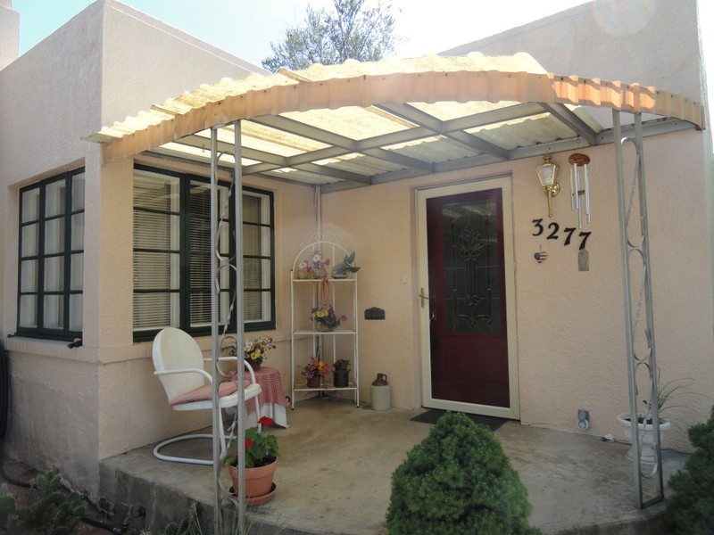 It has a cozy front porch!!