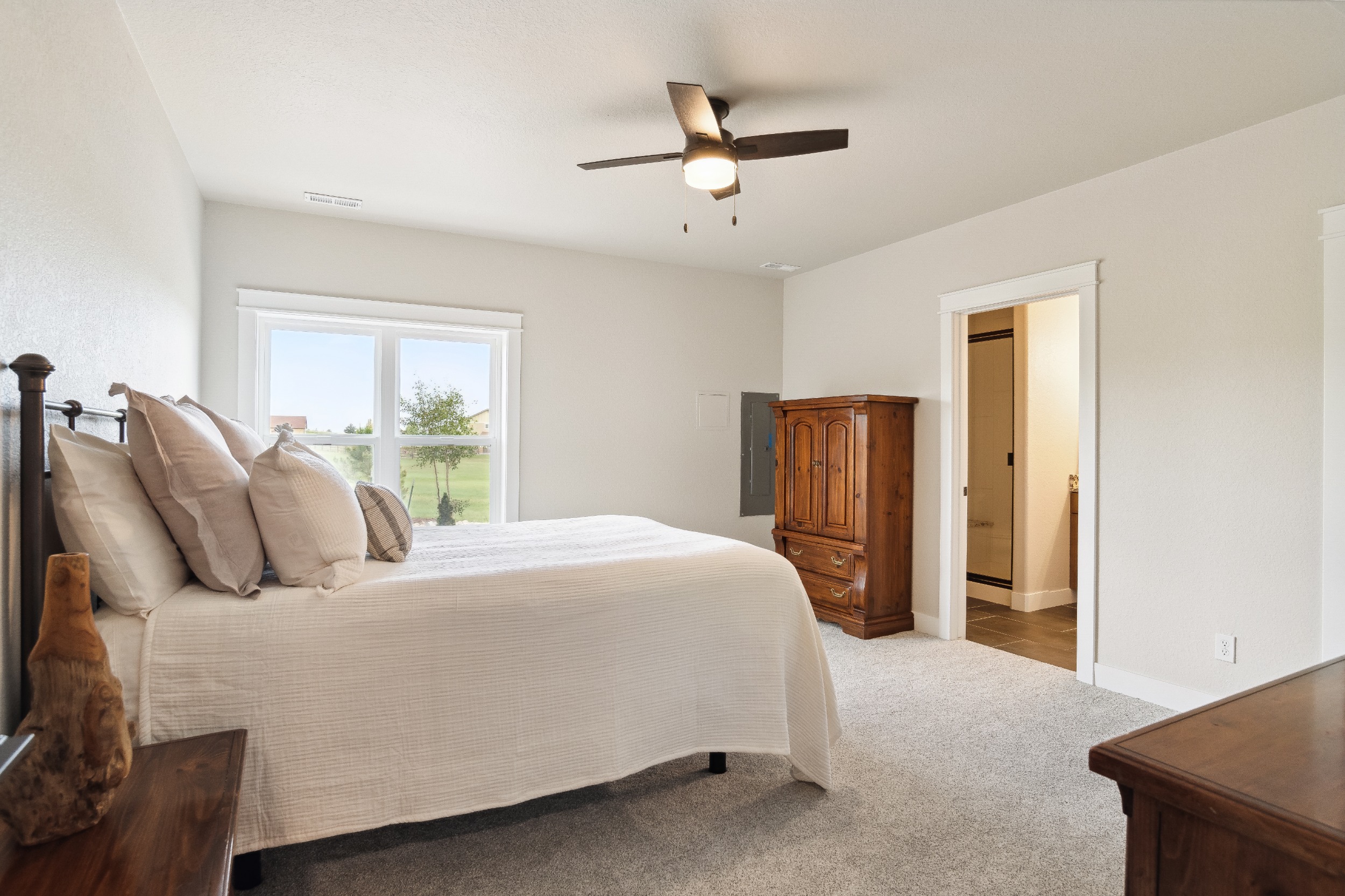 Secondary Basement Bedroom with a Walk in Closet and Bathroom Suite