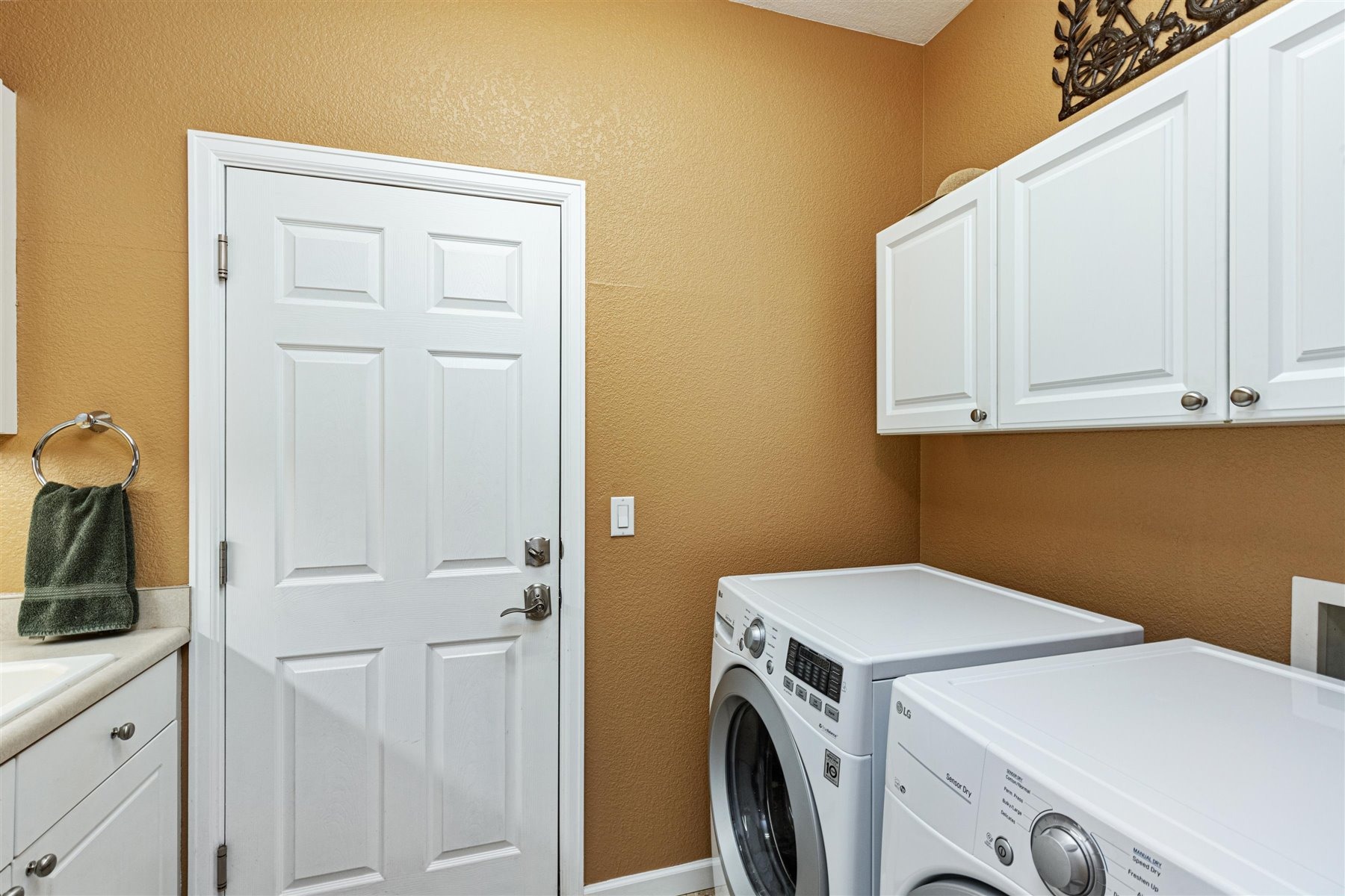 Laundry Room with Utility Sink & Cabinetry