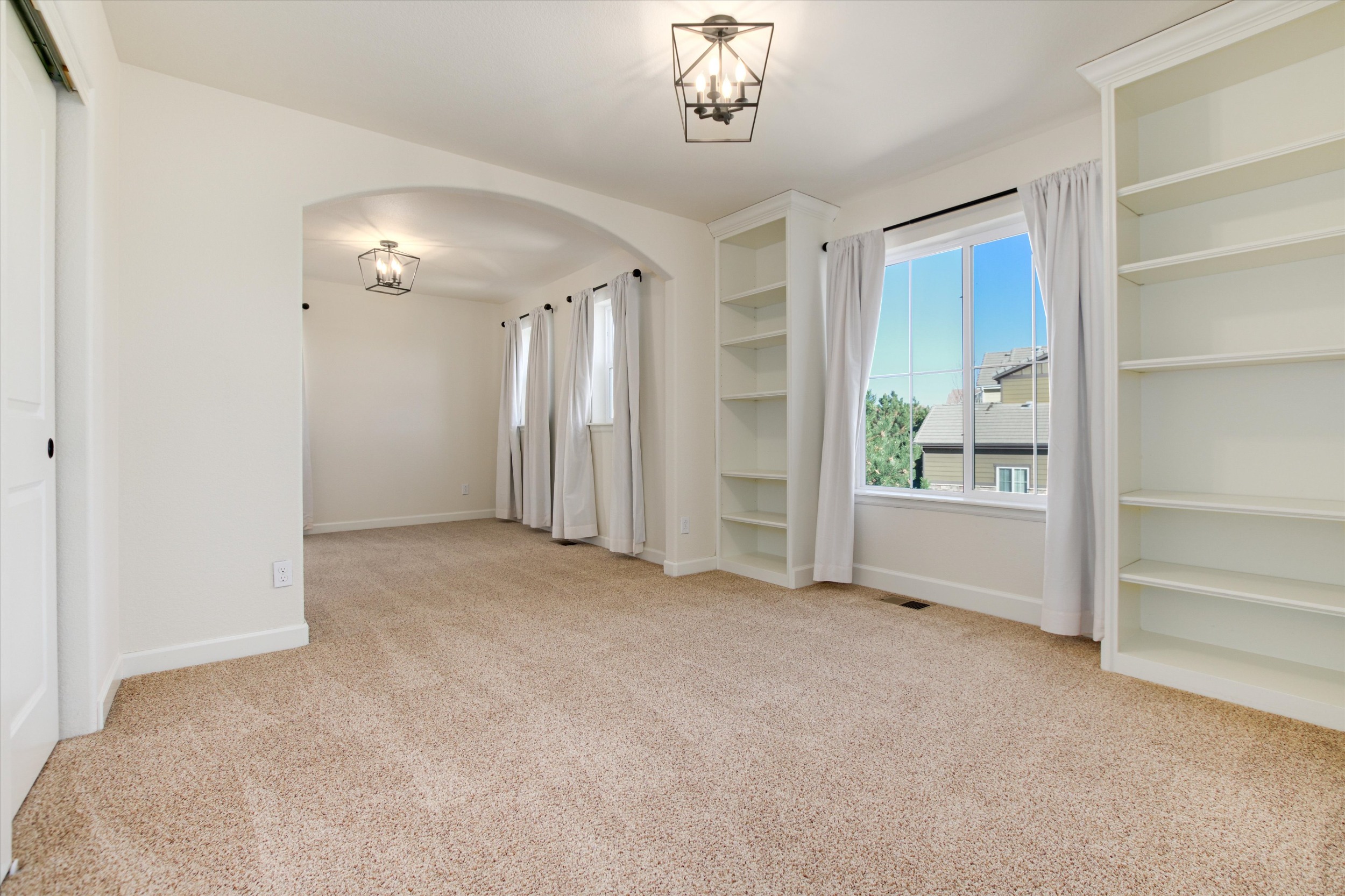 Secondary bedroom, 2 room suite easily converted to 4th bedroom upstairs