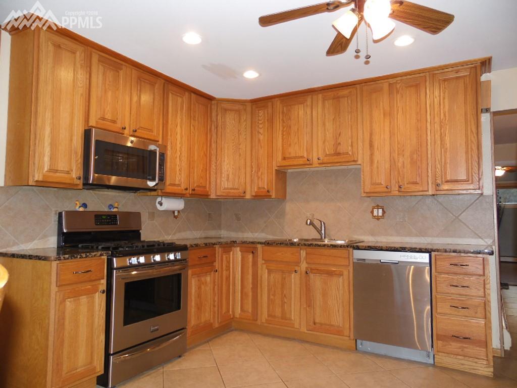 42 Inch Cabinets, 6 Burner Gas Range, Convection Microwave, Tile Back Splash, Gr