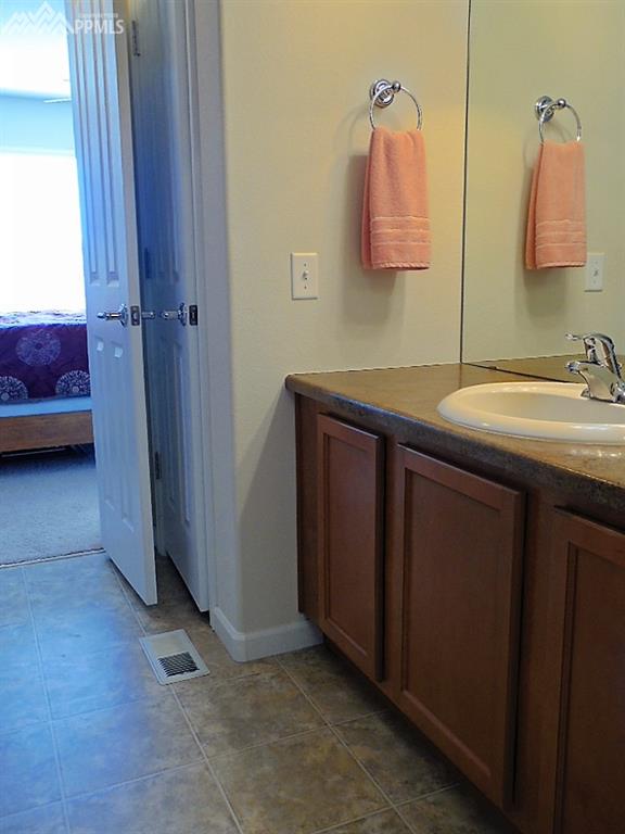 Secondary private a bathroom adjacent to walk-in closet!