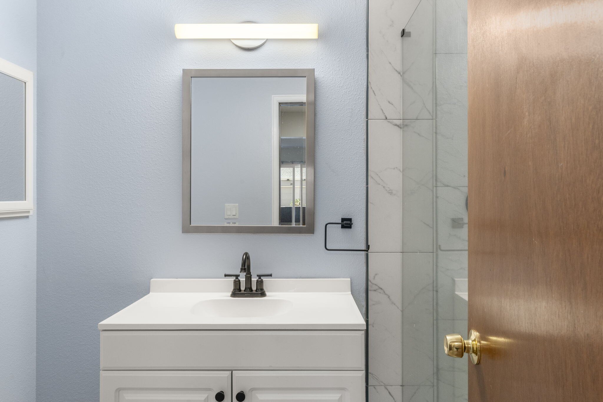 Newer updated modern lighting, fan and fixtures throughout