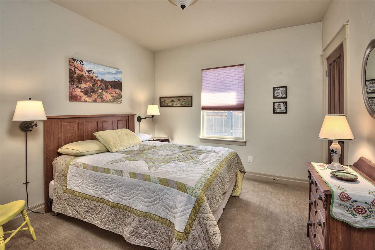 The guest bedroom is roomy and offers a warm and sunny place for your friends an