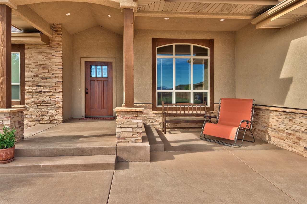 The east-facing front porch lets you watch the sun rise over the city!