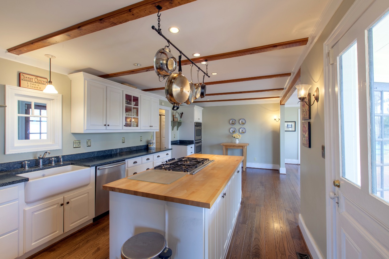 Butcher block counter and gas cook top on Island
