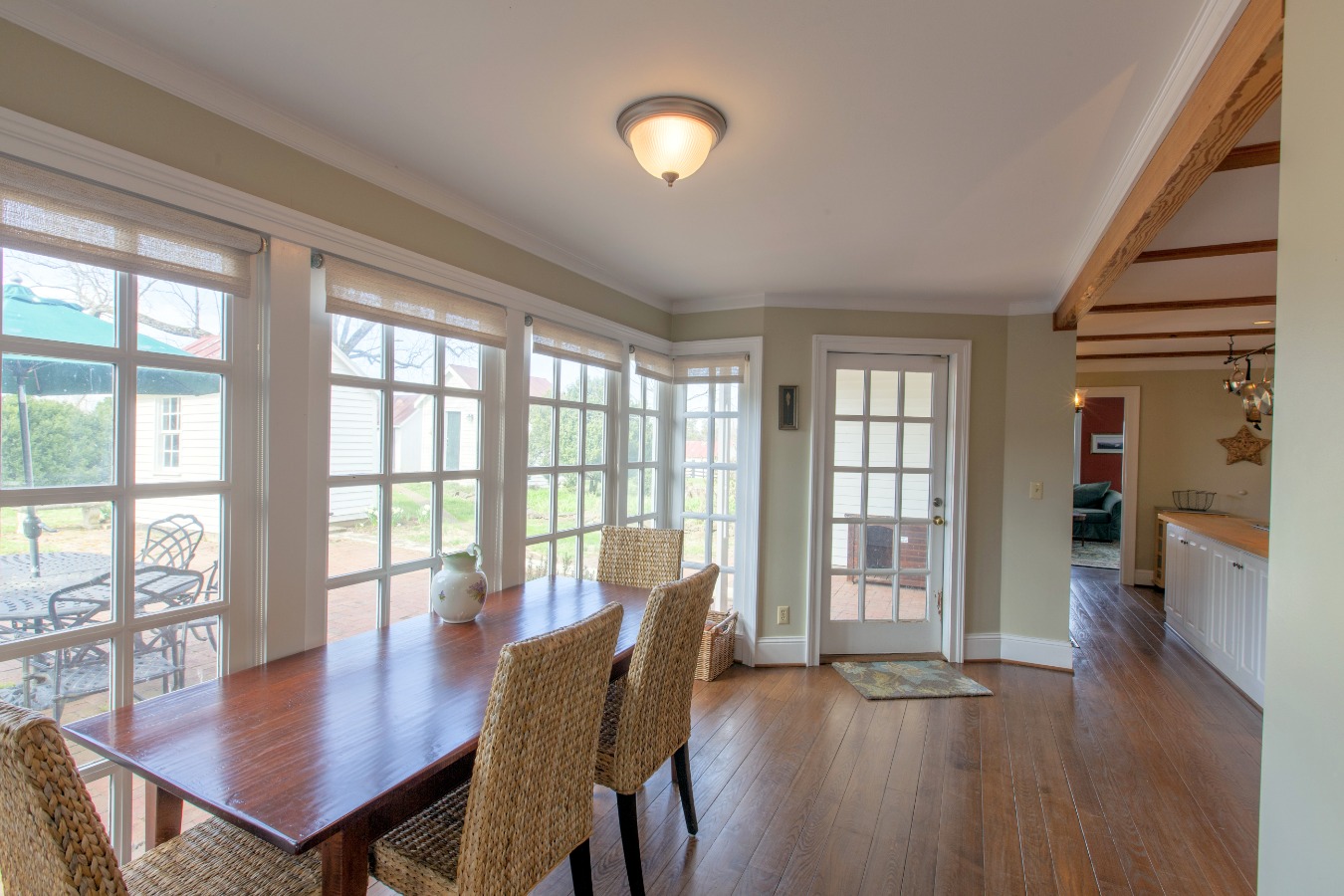 Breakfast area with windows all along the wall