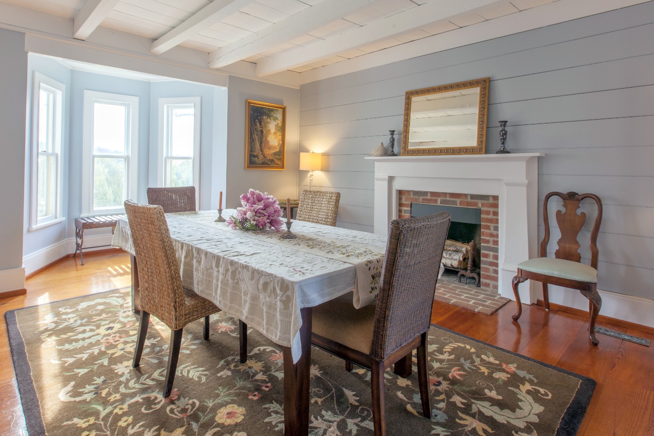 Inviting dining room with shiplap wall boards