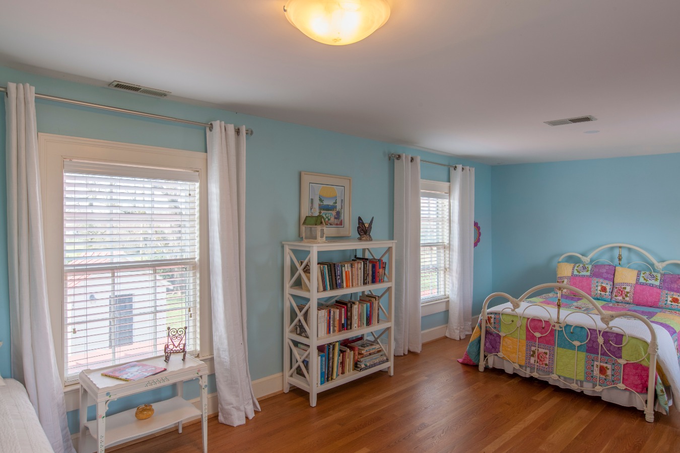 Bedroom has a cedar walk-in closet and full bath with ceramic tile floor
