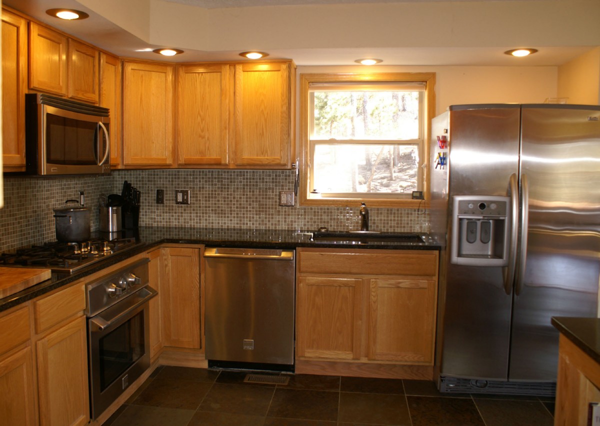 Updated Kitchen with Granite and Glass Mosaic
