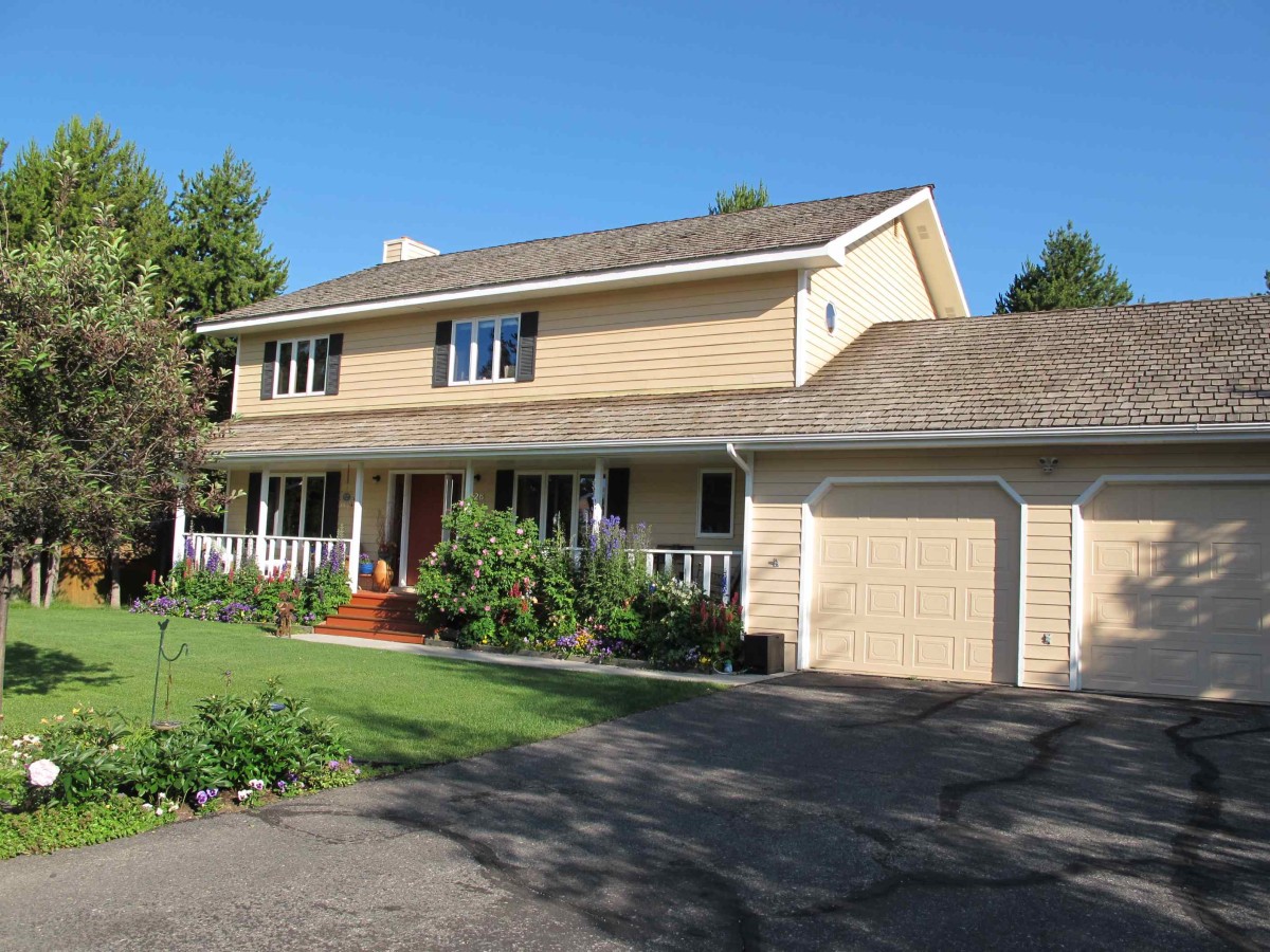2 Car Attached & 3rd Garage w/shop Detached