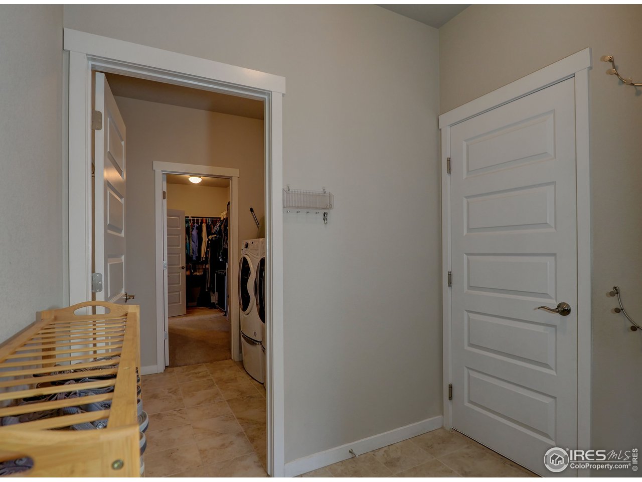 Garage entry to mudroom to laundry to master closet