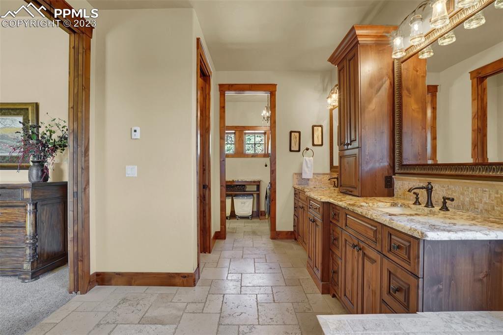 Large Master Bath with Large Walk-In Closet and Separate Laundry area.