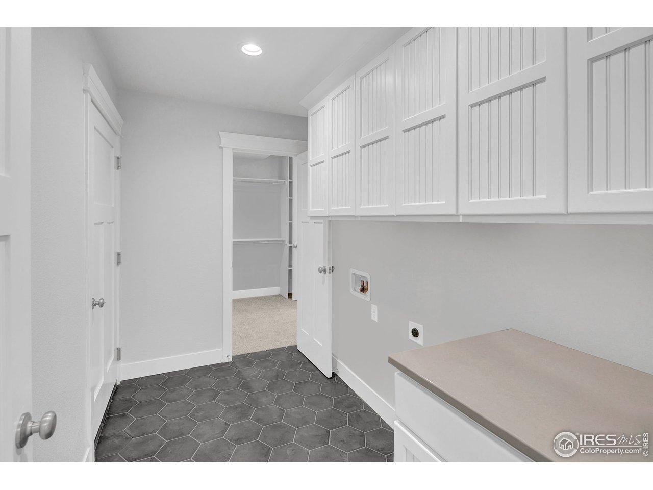 Mudroom/drop zone off the garage and kitchen makes life easier