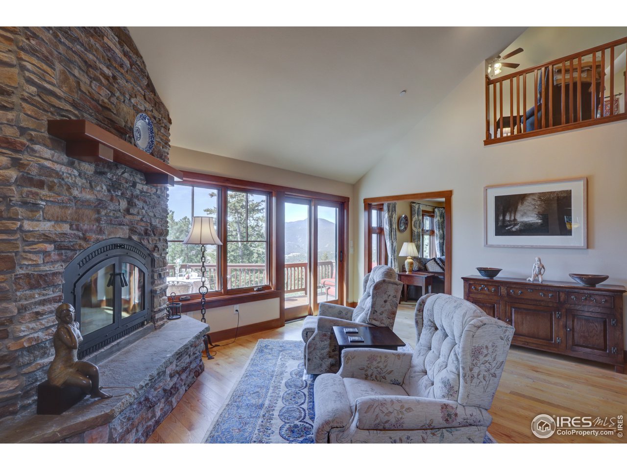 Living Room Features Gorgeous Fireplace, Incredible Views 