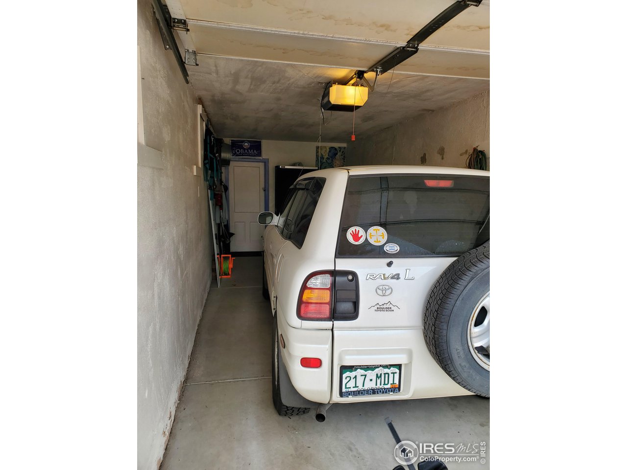Garage bay with car inside