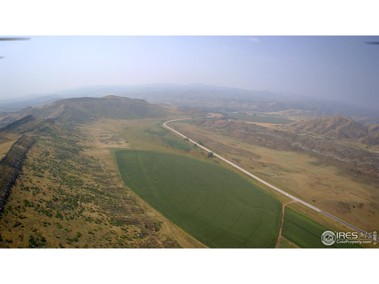 Aerial shot of proposed Glade Reservoir valley.  Currently Hwy 287.