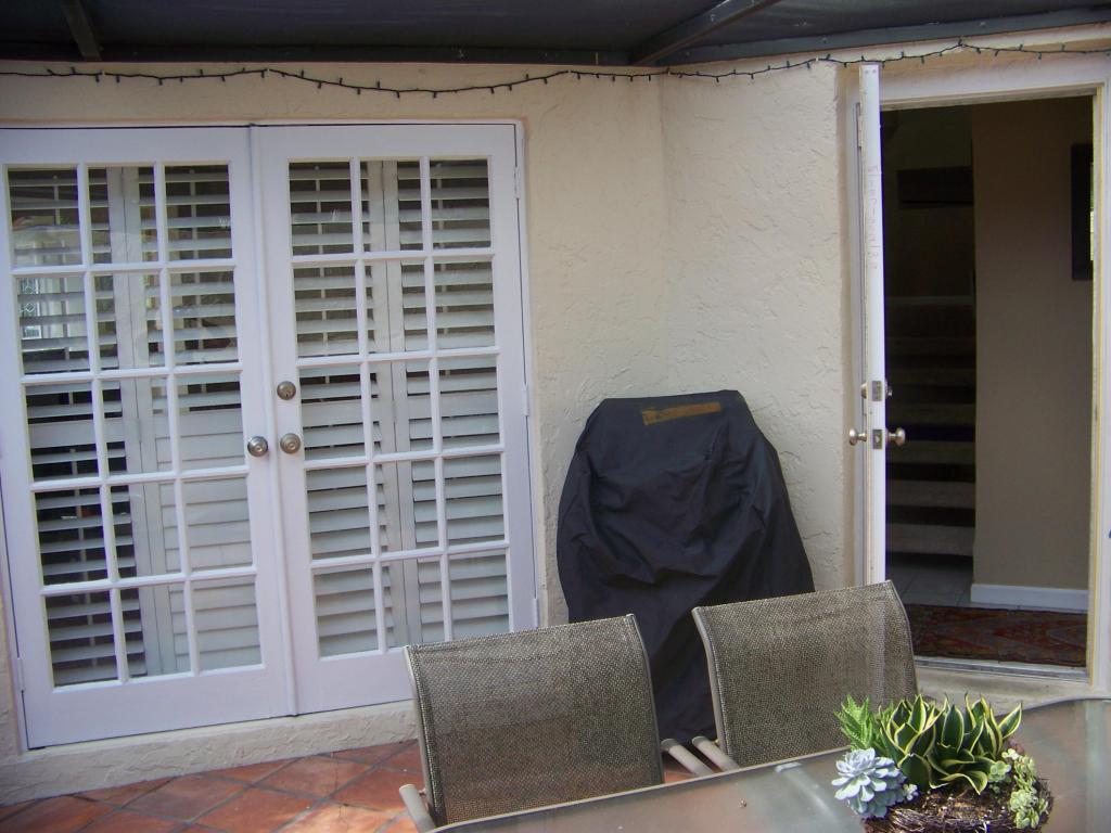 PATIO HAS 3 FRENCH DOORS
