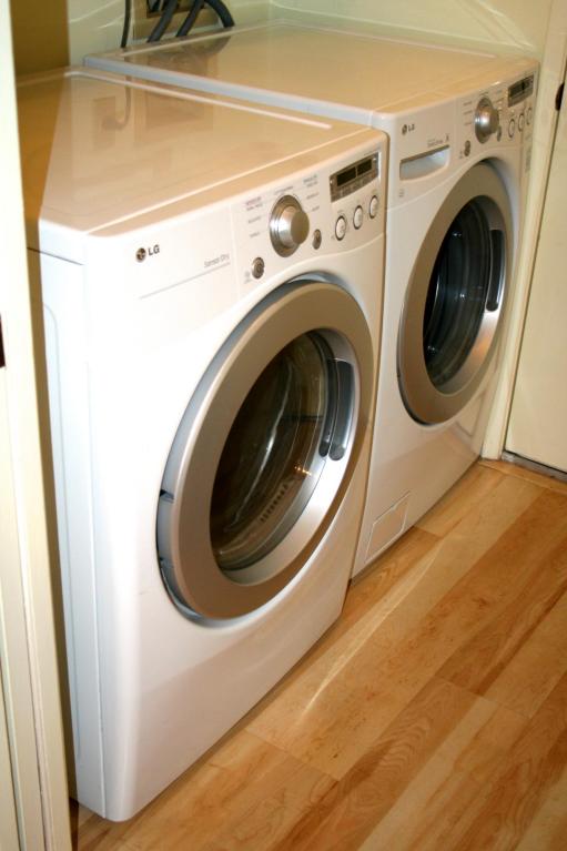 Newer washer and dryer in laundry area