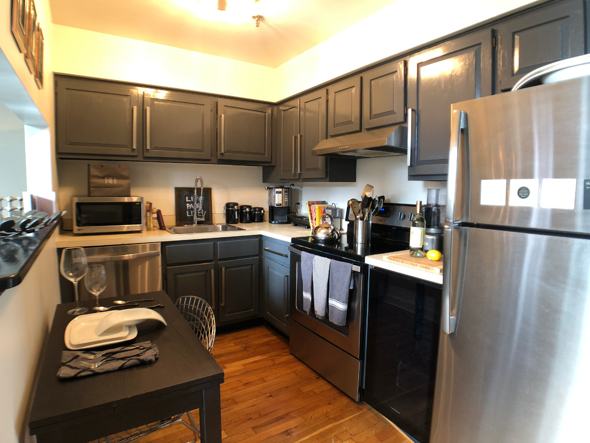 Stainless steel appliances including a dishwasher, wine cooler, remodeled cabine