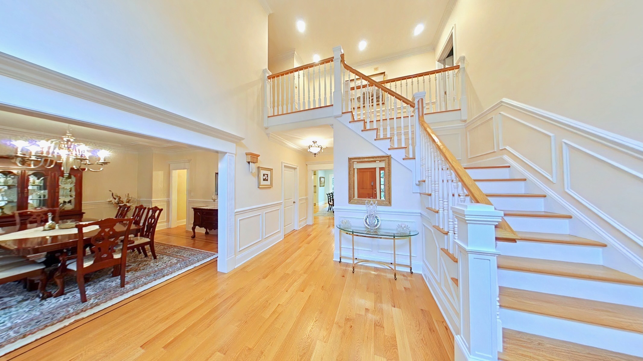 Grand Entrance Foyer. Elegant entry hall with 20’ ceiling.