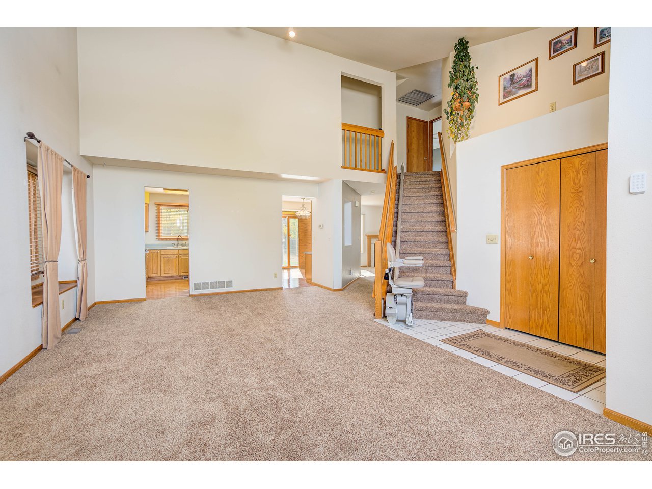 Living Room: 12 x 12 Formal Dining Room: 12 x 10  Step upstairs to find 4 sizable bedrooms & a full bathroom, and the owner suite with a luxury bath, walk-in closet & vaulted ceilings. 