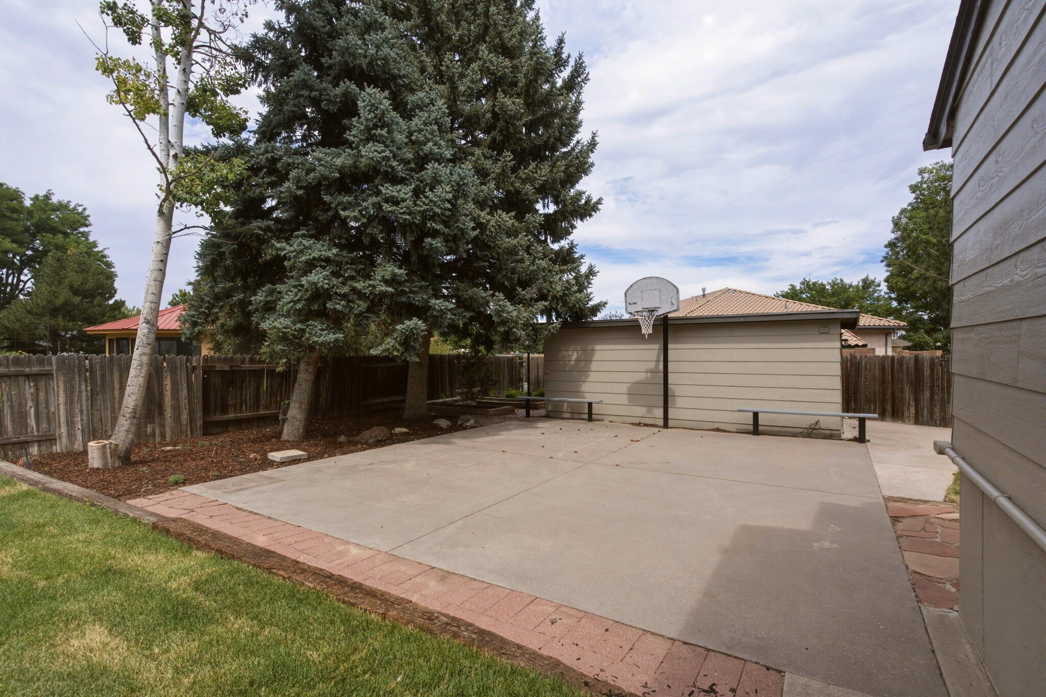 Sports court and storage shed