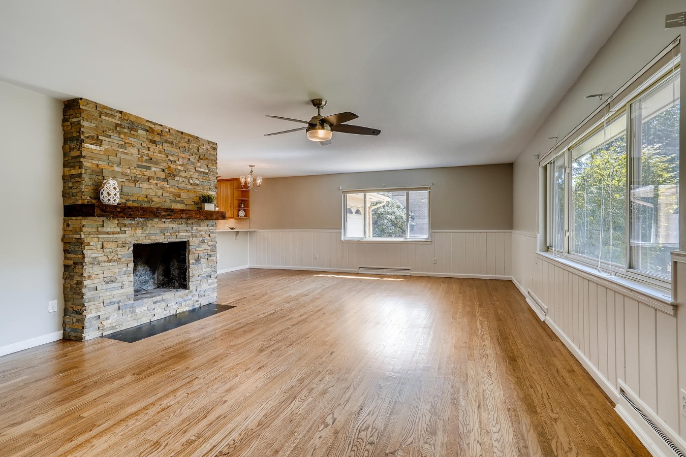 Cozy fireplace and gorgeous original hardwoods