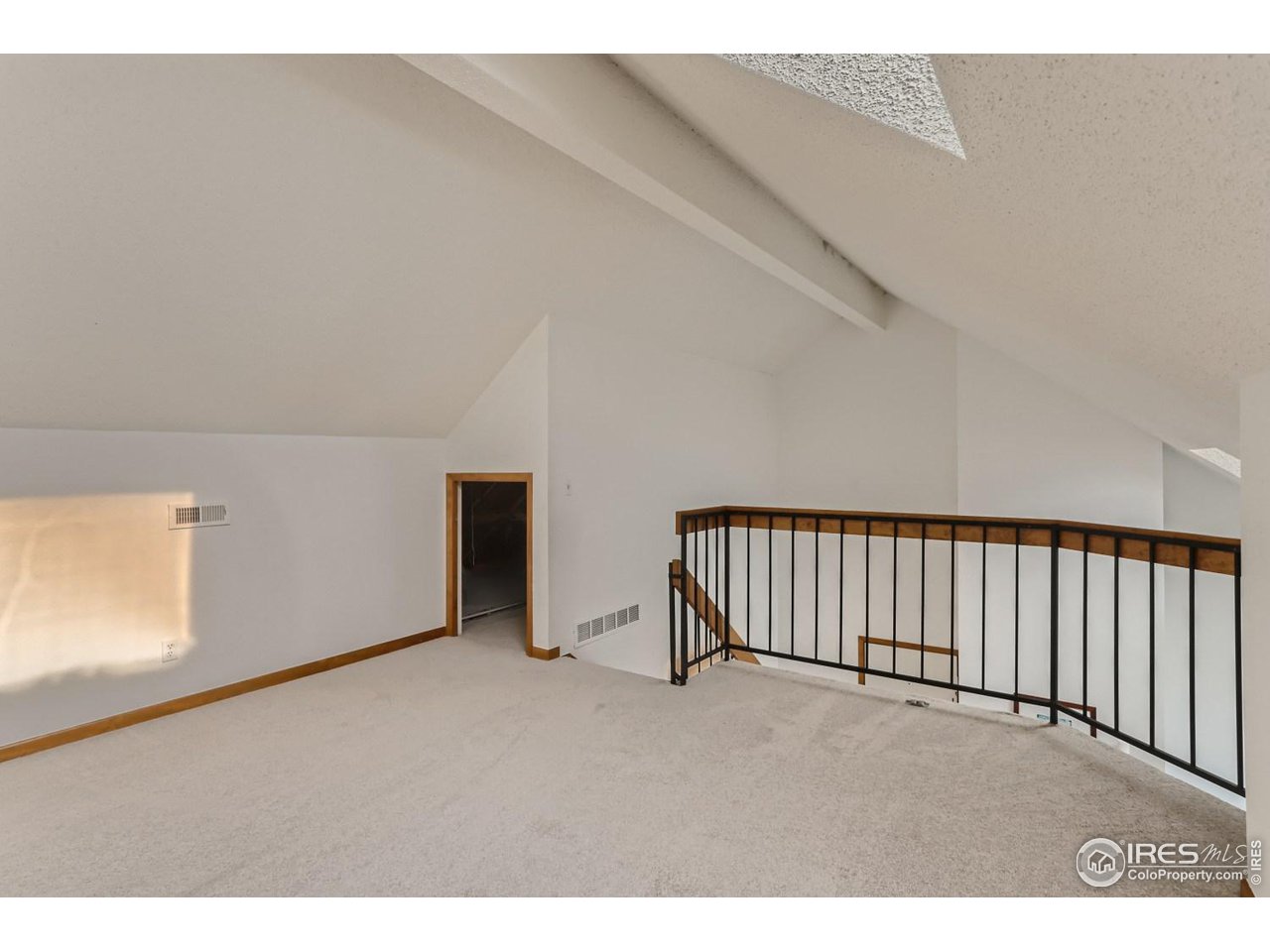 Large loft space, looking to additional storage and HVAC area.