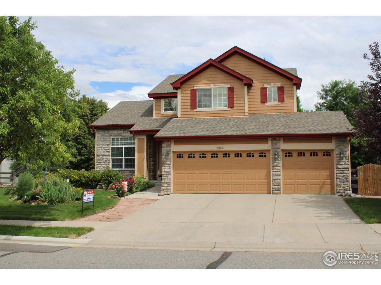 2082 Madison Dr., Erie, CO 80516, backs to open space.