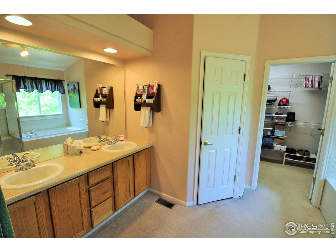 Private master bath with double vanity and big walk-in closet.