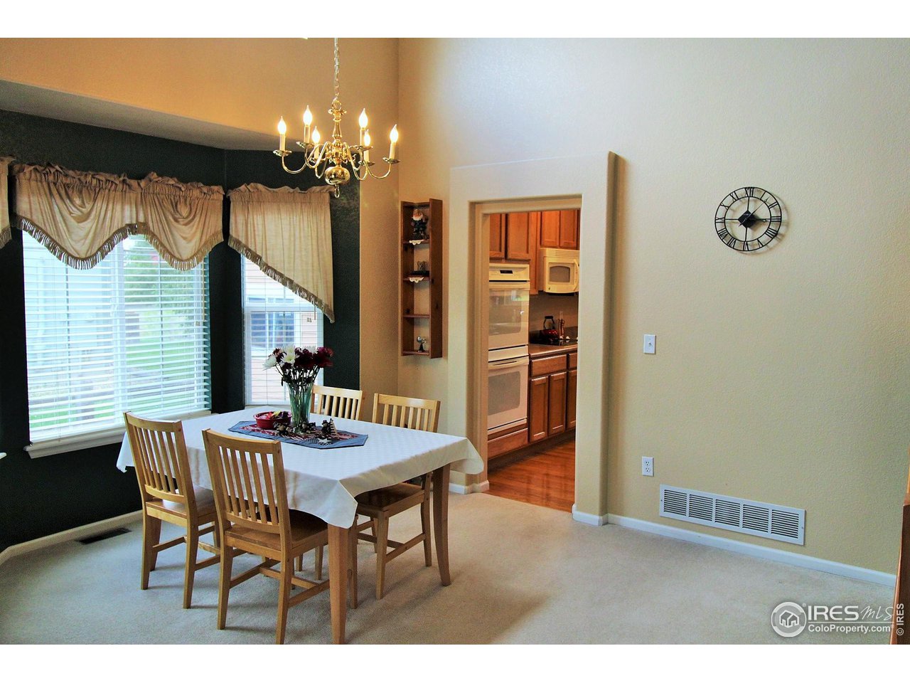 Kitchen flows into the family room with upgraded sliding door to back deck and yard.