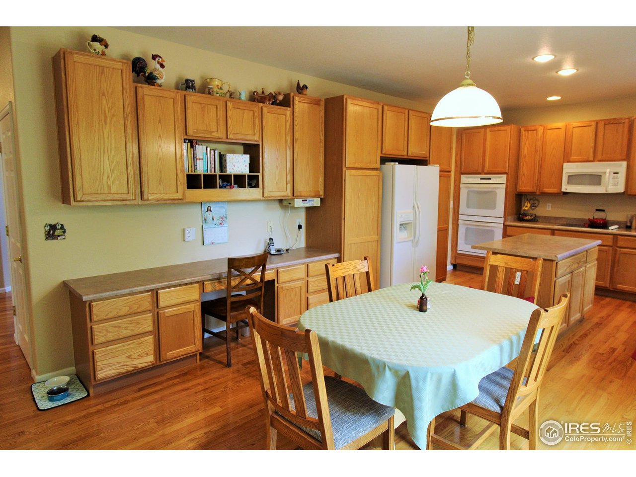 Spacious kitchen with built-in desk / planning area, pantry's, lots of cabinet and counter space.
