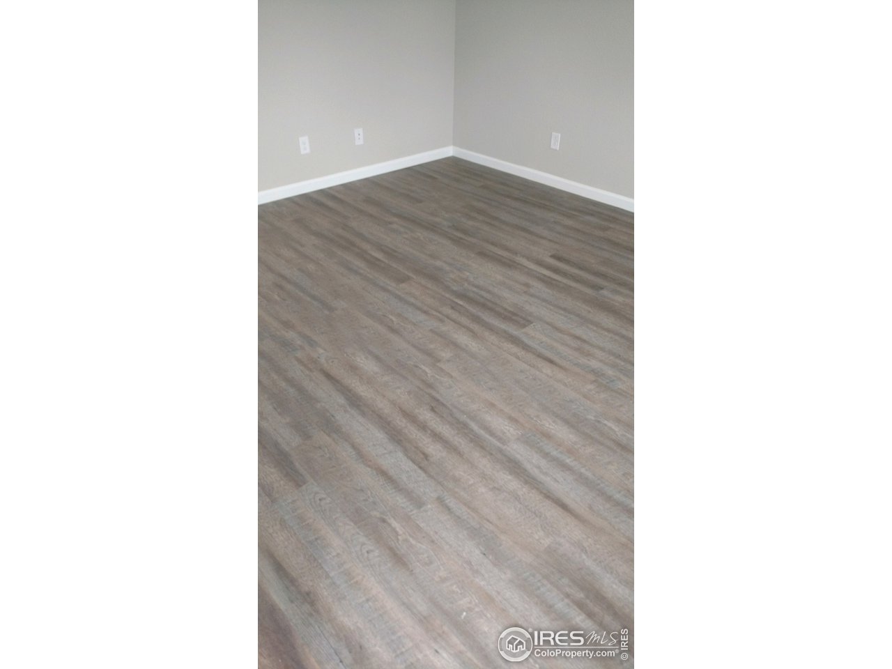 Living Room. Wood Look Vinyl Flooring thru out Main Level
