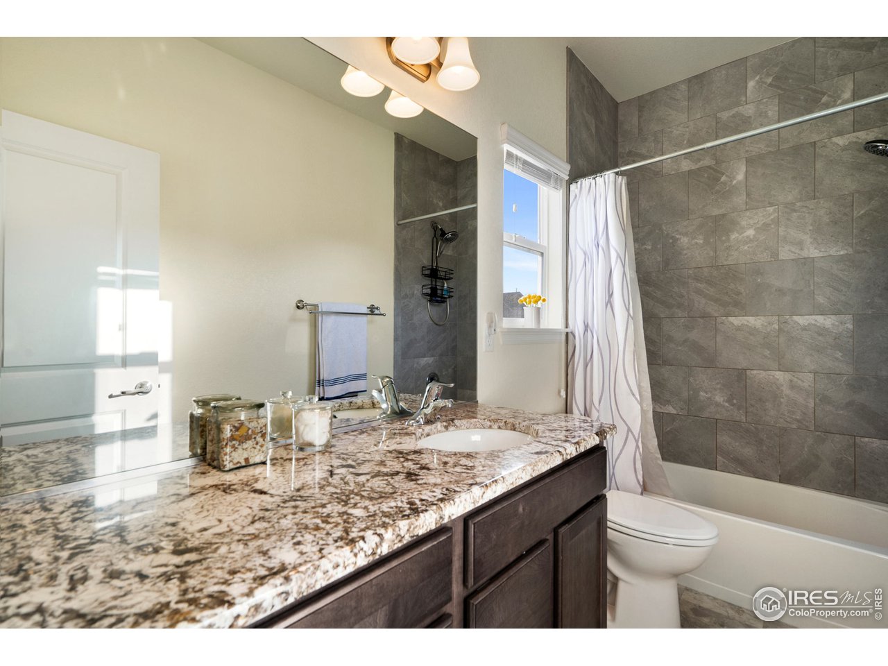 Owner's Bath with Tile and Granite Counters
