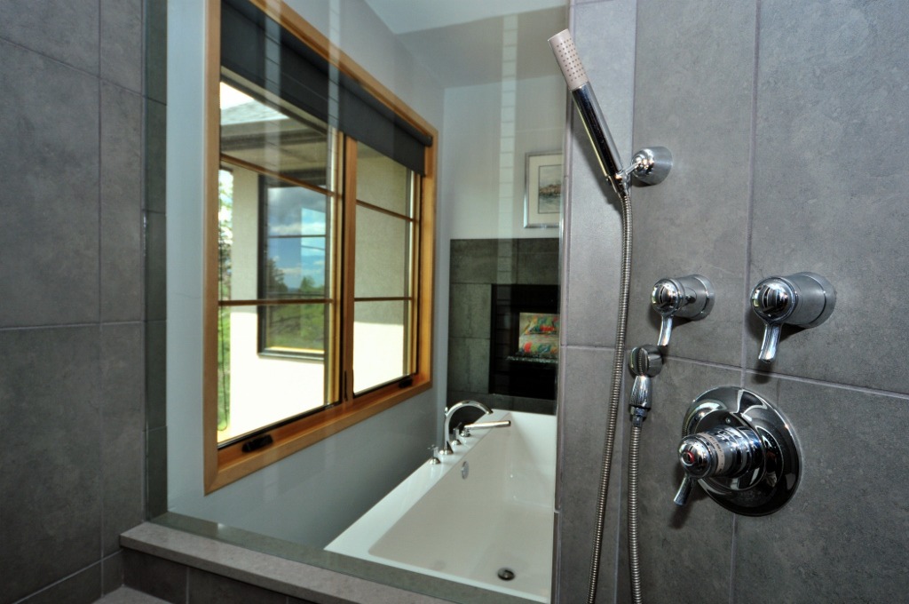 Walk in shower w/ high end finishes