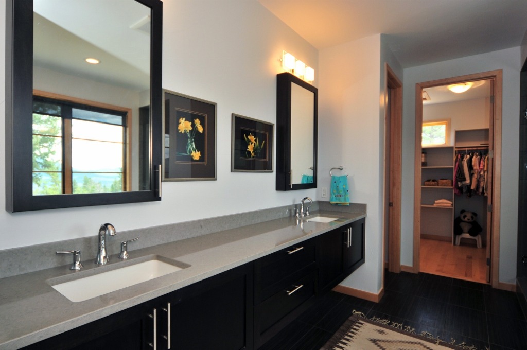 Large open vanities lead to huge master closet